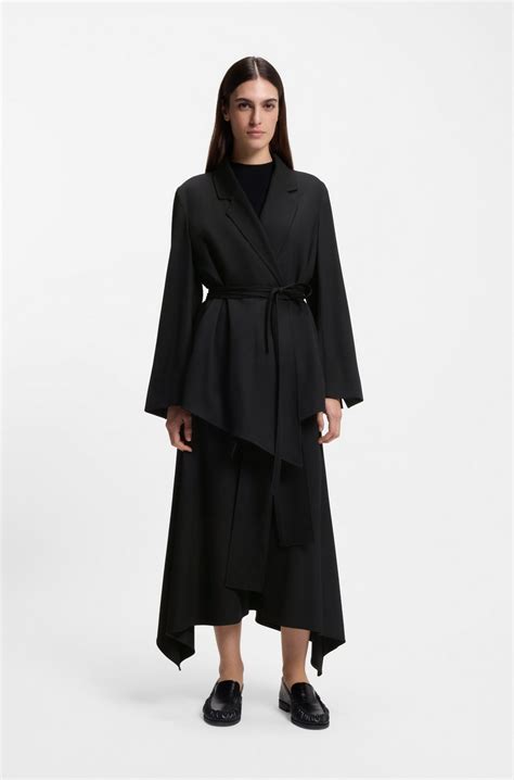 BOSS - Relaxed-fit trousers with shaped hems - Black