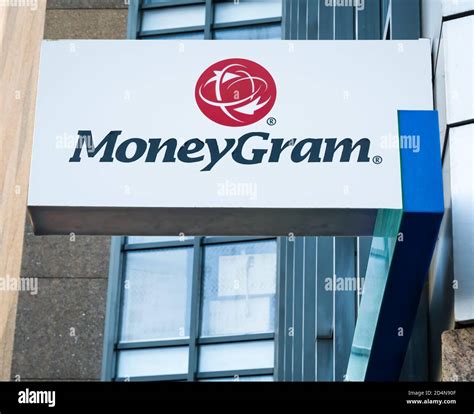 Bucharest/Romania - 09.27.2020: MoneyGram money transfer sign and logo mounted above the ...
