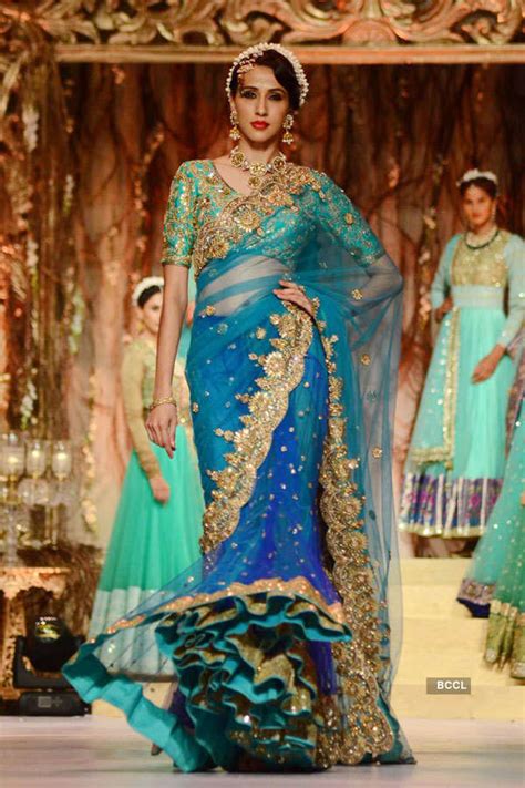 A model walks the ramp for fashion designer Vikram Phadnis during the ...