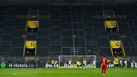 Bundesliga broadcaster offers viewers recorded crowd noise as league to ...