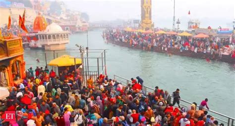 makar sankranti: Watch: Devotees take holy dip in Ganga on Makar ...