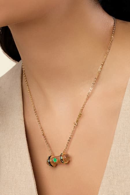 Buy Gold Plated Lunar Light Necklace by Isharya Online at Aza Fashions.