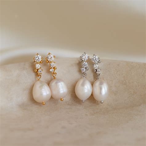 Dangling Pearl Diamond Earrings by Caitlyn Minimalist • Dainty Pearl ...