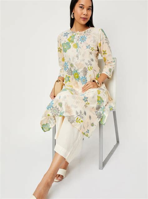Buy Women Cotton Printed Straight Kurta with Palazzos Online at just Rs ...