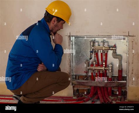 Underfloor heating installation. Water floor heating system interior ...