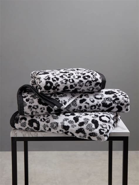 Buy Fusion Black Animal Print Jacquard Bath 100% Cotton Towel from Next ...