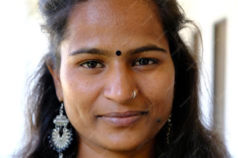 Premium Photo | Closeup portrait of a young indian woman with a bindi ...