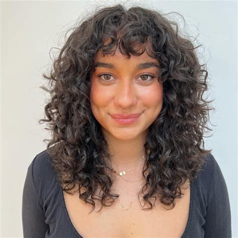 12 Trending Hairstyles With Curly Bangs To Try ASAP