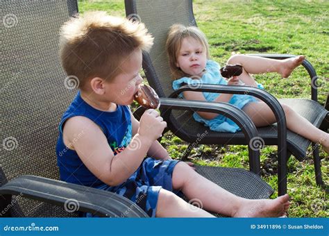 Children and ice cream stock photo. Image of curious - 34911896