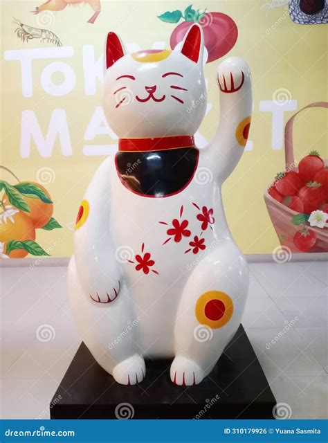 MANEKI NEKO. a Small Stuffed Cat Statue is Believed To Bring Good Luck To Its Owner, in Chinese ...