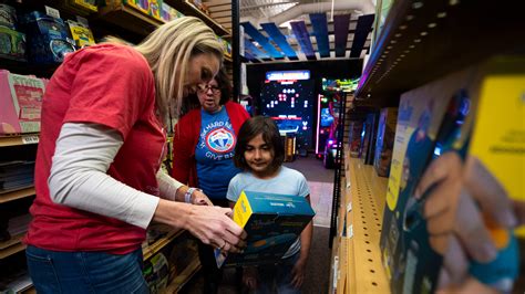 Photos: Iowa Wolves host Home for the Howlidays shopping spree at Scheels