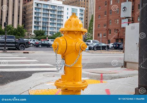 Fire Hydrant Yellow Color in the City Center, Sunny Day Editorial Image ...