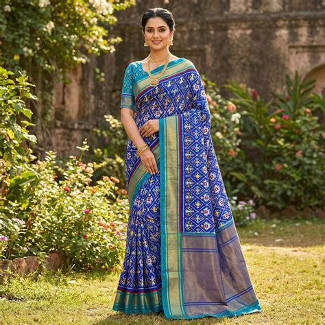 Royal Blue Ikkat Print Dola Silk Saree Highlighted with an Elegant Zar