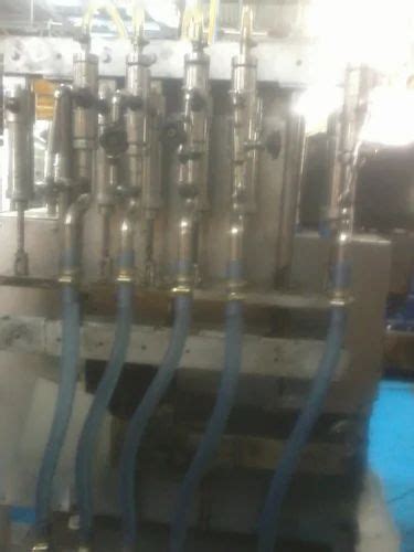 Oil Filling Machine - Mustard Oil Bottle Filling Machine Manufacturer ...