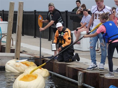 Giant pumpkins are carved into race boats at this U.P. fall festival ...