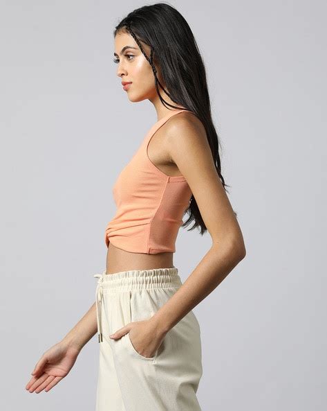 Buy Peach Tops for Women by Outryt Sport Online | Ajio.com