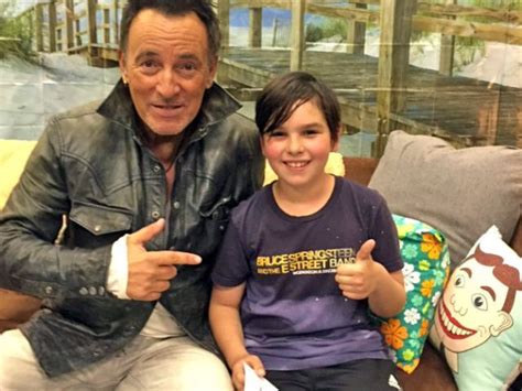 Image result for Bruce Springsteen Holding Baby