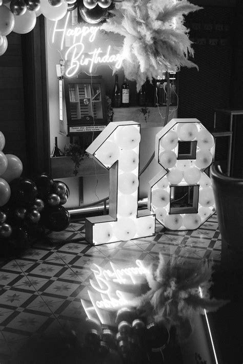 Free picture: Number eighteen (18) on a tile floor with lit up neon ...