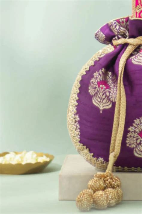 Buy Tantavi Pure Raw Silk Embellished Potli - Violet- The AMYRA Store