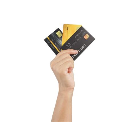 Hand holding many credit cards clipping path | Premium Photo
