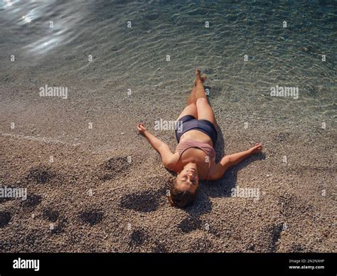 Cheerful woman enjoying the beach Oludeniz Blue Lagoon Turkey. Life of ...