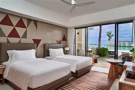 https://www.koamastravel.com/photos/resorts/2199-2-HardRockHotelMaldivesSilverBeachStudioSliverBeachStudio-62861689fbf9b23d147c45adea60aade2-med.jpg