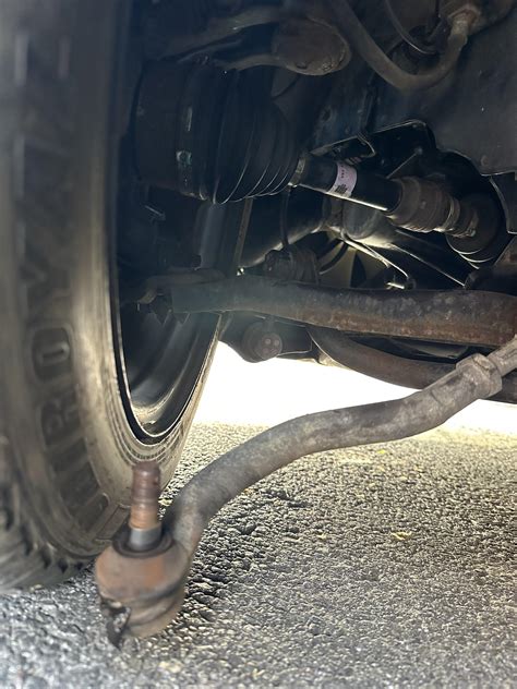 What are these giant metal bars stick into my front tire? (2006 civic ...