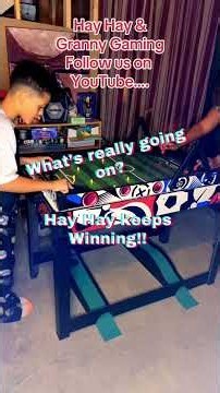 Hay Hay & Granny playing pinball soccer.