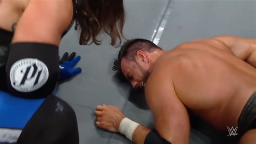 Wrestlers secretly communicating mid-match