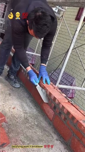 Showing skill of bricklayer - Brick wall installation