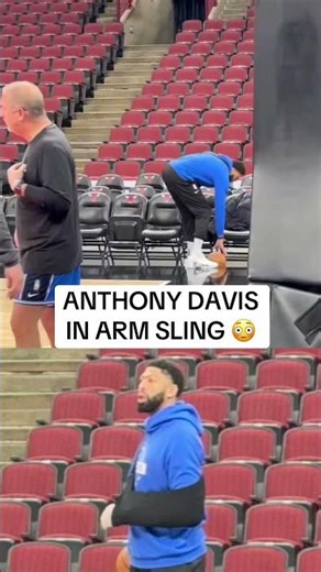 Anthony Davis in arm sling at Mavs shoot around.