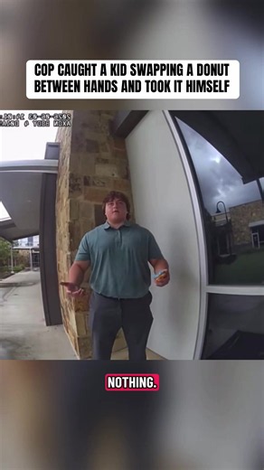 In June of 2026, an officer spotted a kid tucked into a corner acting suspicious and asked what he was hiding. The kid kept passing a blue frosted donut from hand to hand every time he was asked to show them, until the officer caught on and demanded both hands at once. Without saying much, the officer grabbed the donut straight out of his hand, ate it on the spot, and walked off telling him to have a good day. #bodycam #cop #funnycop #donutcop #lawenforcement