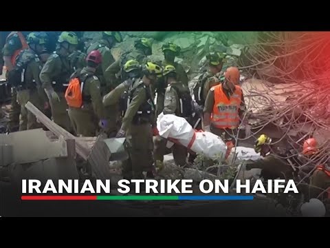 Israeli rescuers recover bodies under rubble in Haifa after Iranian strike