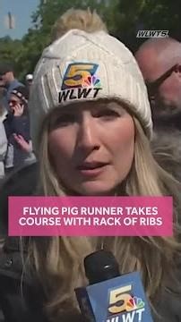 Flying Pig marathon runner eating rack of ribs while on the course. Here's why.