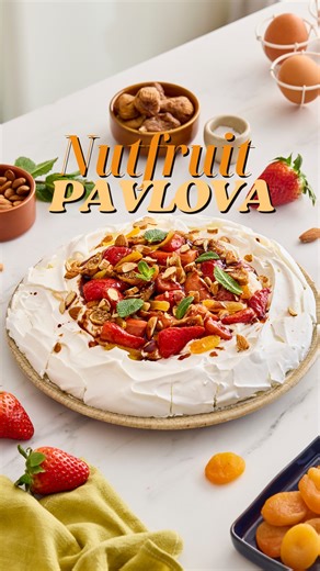 Homemade pavlova — perfect for holiday moments and sharing with guests. Easy to make and unbelievably good. 🎉🍓 A crisp meringue shell filled with whipped cream, topped with juicy strawberries, sweet dried figs, chewy dried apricots, toasted almonds, and a touch of mint — all coming together in one gorgeous pavlova. Every bite is a perfect mix of textures and flavors. Proof that dessert really can have it all. 🌟 Full recipe in our bio! | Nutfruit