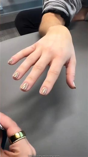 The doctor put a bandage on the girl's hand.