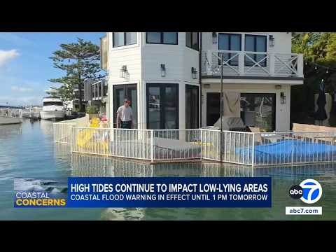 Record-breaking high tides swamp patios, private docks in Newport Beach