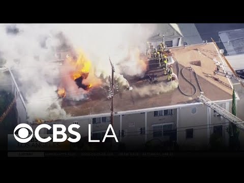 Crews work to extinguish Koreatown apartment building fire