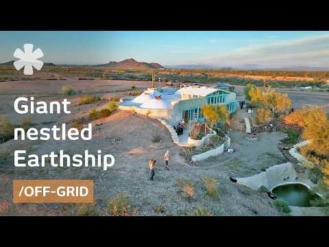 Giant Earthship on desert cliff is 3-story home with cathedral-size garden