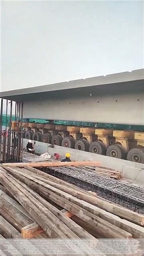 Industrial-grade precision operations in elevated bridge construction.