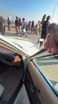 A clean 1982 Toyota Corolla alongside a standout collection of rims