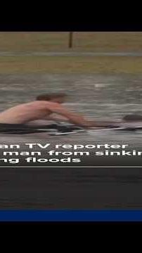 TV reporter pulls man from stranded truck seconds before it sinks