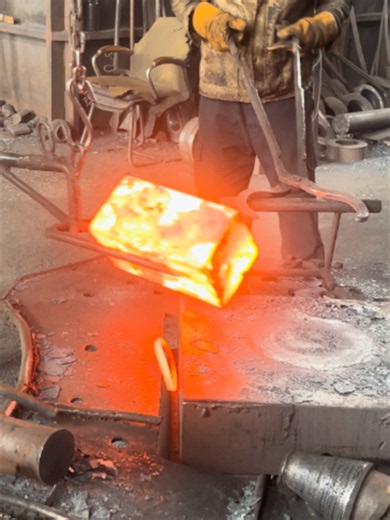 Steel Billet Being Punched Open — Forging Factory Process