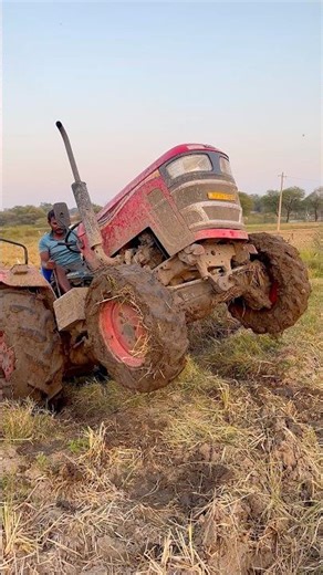 Mahindra 4wd tractor stuck in mud #shorts #trending #tractor