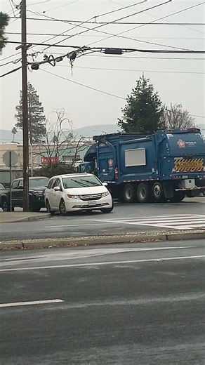 The Republic Waste Services garbage truck returns to the transfer station/yard.