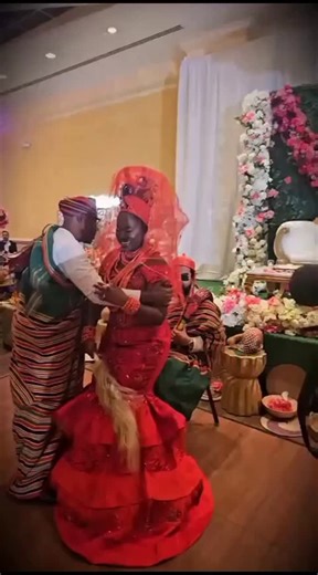 From her father's arms to her new family’s home. 👑 The Edo 'sitting ceremony' is a powerful symbol of a daughter's transition into her husband’s family. Watching the bride perform this ritual 7 to 11 times on her father-in-law’s lap is a reminder of the deep roots and respect in Nigerian traditions. Culture is the soul of a people! 🇳🇬✨ #nativetray #fypシ❤️💞❤️ #edobride #culturedaily #nigerianculture | Native Tray Hospitality