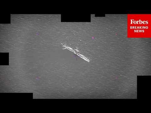 Pentagon Releases Footage Of 'Multiple Spherical UAP Near Sub' Seen 'In And Out Of Water'