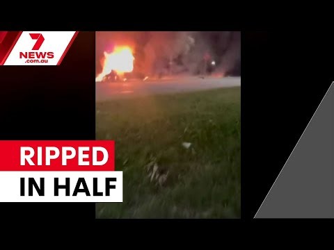 Driver flees after BMW ripped in half | 7NEWS