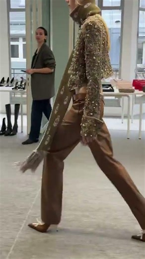 McQueen Autumn Winter 2026 In the Atelier: hand-distressed embroidered frogging with pearl details.