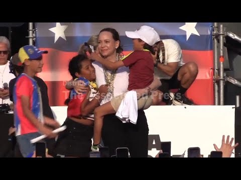 Venezuela’s Maria Corina Machado draws a huge Madrid crowd and rebuffs meeting with Spain's PM